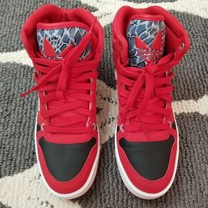 Red Adidas high top shoes